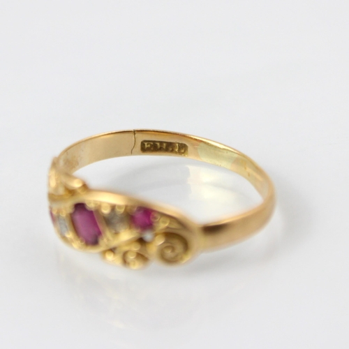 104 - An early 20th century yellow metal ring, the red stone set ring with rose cut diamond detail, set wi... 