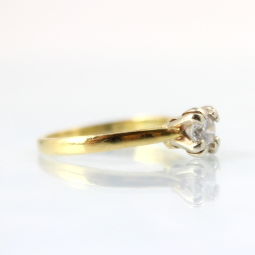 106 - An Edwardian style diamond solitaire ring, the round cut diamond within four double claw setting edg... 