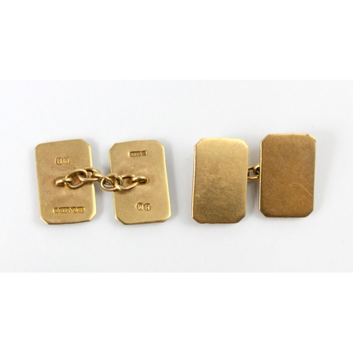 115 - A pair of 9ct yellow gold cufflinks, the plain polished rectangular links with canted corners, stamp... 