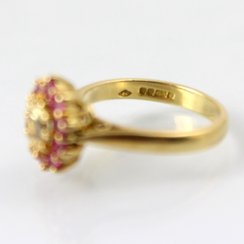 121 - A bespoke untested yellow sapphire and pink spinel cluster ring, the central oval cut untested yello... 