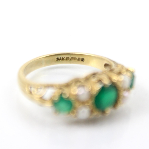 134 - A 9ct yellow gold Victorian style untested emerald and pearl ring, the central round cut green stone... 