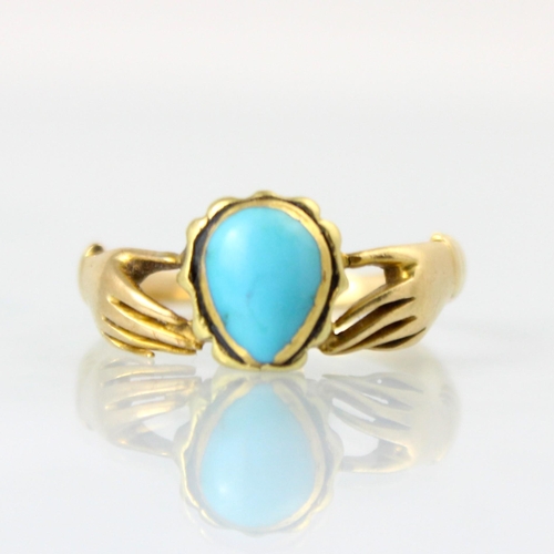 147 - A Regency style fede style ring, the central turquoise coloured cabochon clasped by two hands leadin... 