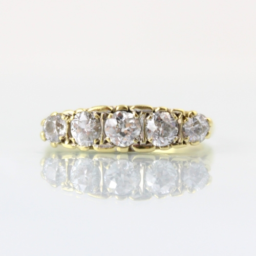 148 - A Victorian style diamond five stone ring, the central old cut diamond with two graduated mixed cut ... 