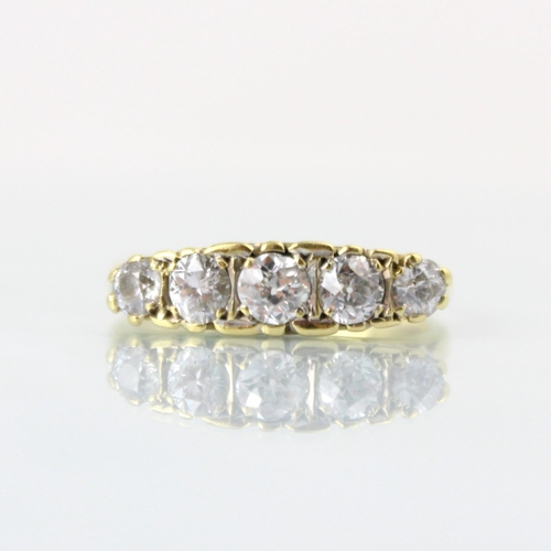 148 - A Victorian style diamond five stone ring, the central old cut diamond with two graduated mixed cut ... 