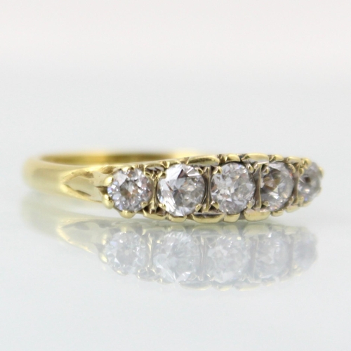 148 - A Victorian style diamond five stone ring, the central old cut diamond with two graduated mixed cut ... 