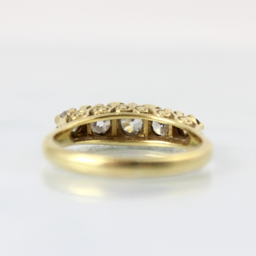 148 - A Victorian style diamond five stone ring, the central old cut diamond with two graduated mixed cut ... 