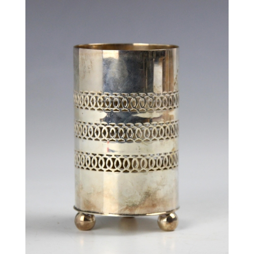 33 - A George V silver sleeve, S J Levi & Co, Birmingham 1931, of cylindrical pierced form with triple op... 