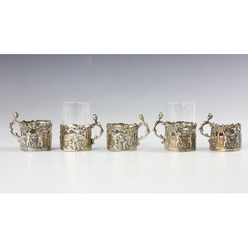 41 - A set of five Victorian silver cup mounts, William Comyns and Sons Ltd, Birmingham 1889, of cylindri... 