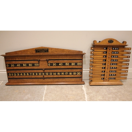 577 - A Stevens & Sons of London billiard/snooker scoreboard, early 20th century, in medium oak with four ... 