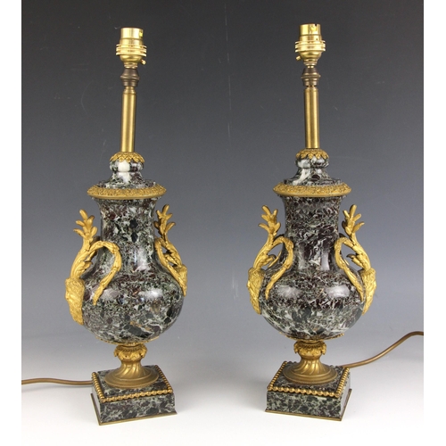 606 - A pair of variegated green marble and ormolu mounted lamp bases, early 20th century, of baluster for... 