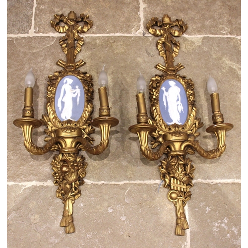 609 - A pair of giltwood and gesso Jasper plaque inset wall sconces, 19th century, each with a ribbon bow ... 