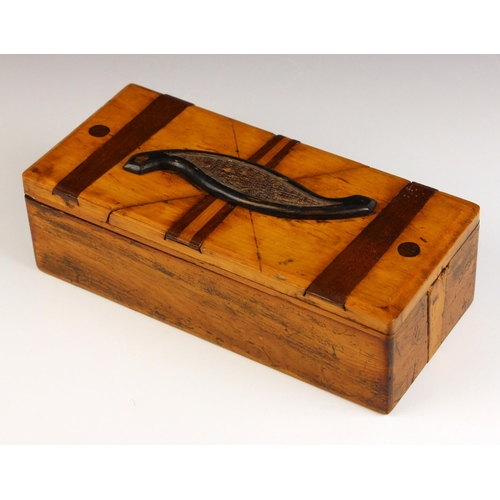 657 - A treen puzzle box, probably early 20th century, the pine box with sliding and rotating lid sections... 