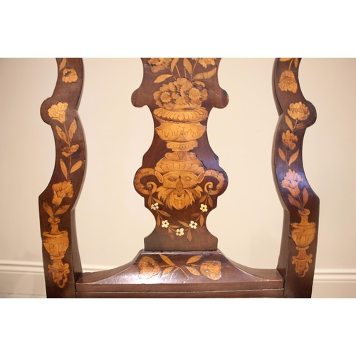 677 - A set of three Dutch marquetry walnut dining chairs, 18th century and later, each with a shell carve... 