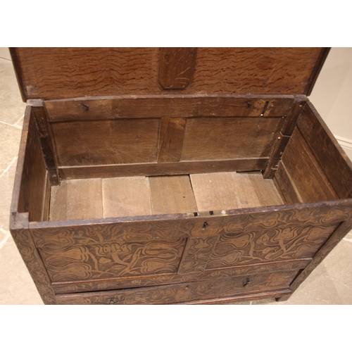 681 - A 17th century and later carved oak mule chest, the hinged twin plank moulded top opening to a vacan... 