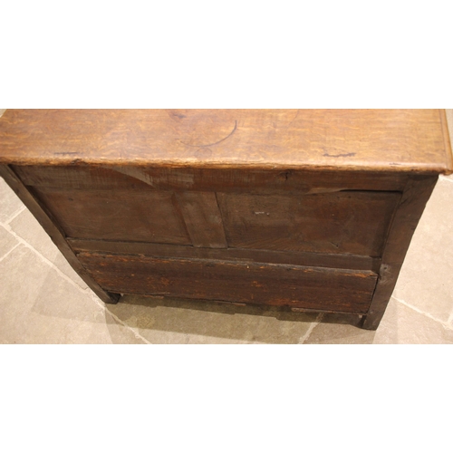 681 - A 17th century and later carved oak mule chest, the hinged twin plank moulded top opening to a vacan... 