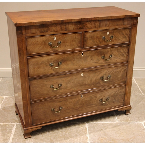 701 - A George IV mahogany chest of drawers, the rectangular top over a secret frieze drawer and an arrang... 