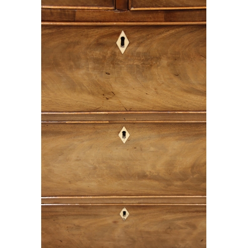 701 - A George IV mahogany chest of drawers, the rectangular top over a secret frieze drawer and an arrang... 