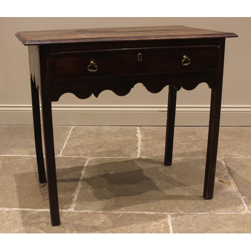 716 - A George III oak and mahogany crossbanded side table, the moulded  top over a single lip moulded, oa... 