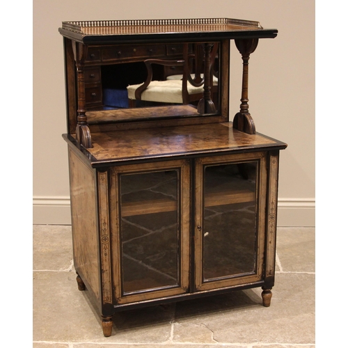 738 - A Victorian burr walnut and ebonised music cabinet by James Shoolbred, London, the upper tier with a... 