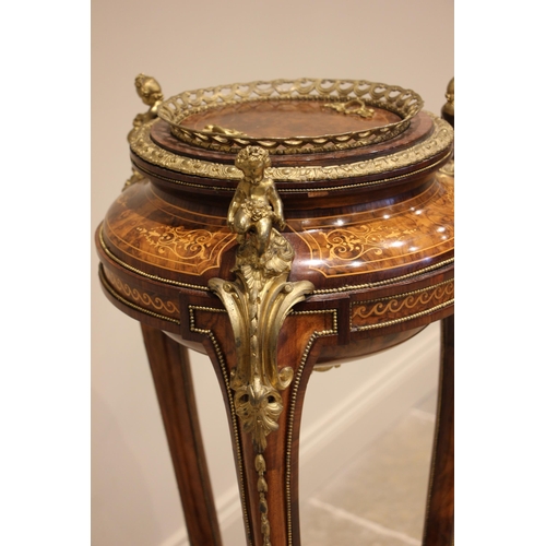 746 - A 19th century style French walnut and kingwood jardiniere stand, inlaid with foliate and scroll mot... 