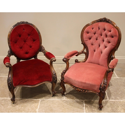 749 - A Victorian carved walnut, button back upholstered open armchair, upholstered in pink velour, the wa... 