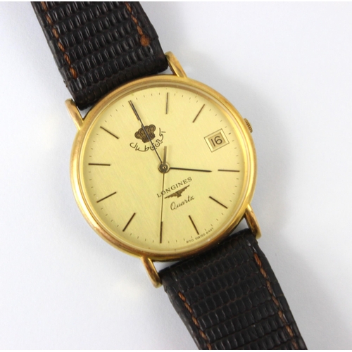 77 - A Longines quartz wristwatch, the circular gold coloured dial with baton markers and date aperture t... 