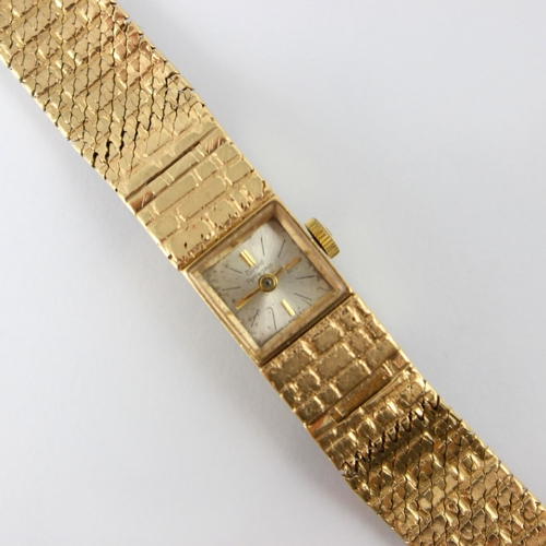 78 - A 9ct yellow gold Girard Perregaux ladies wrist watch, the square silver coloured dial with baton ma... 