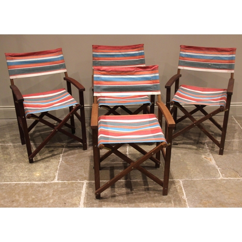 791 - A set of four teak director's chairs, late 20th century, each of typical folding 'X' form, united by... 