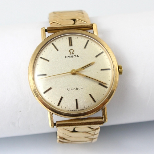 83 - A yellow metal cased Omega Geneve wristwatch, the silver coloured dial with baton markers, set to pl... 