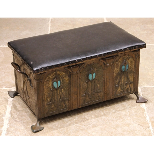 535 - An Arts and Crafts embossed copper covered wooden coal box/stool, in the manner of Archibald Knox, f... 