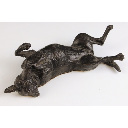 547 - Belinda Sillars (British, b.1961), a patinated bronze model of a dog rolling on its back, signed to ... 