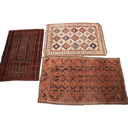 636 - Three assorted Caucasian rugs, to include; a panel design on an ivory ground, 145cm x 102cm, a Bohka... 