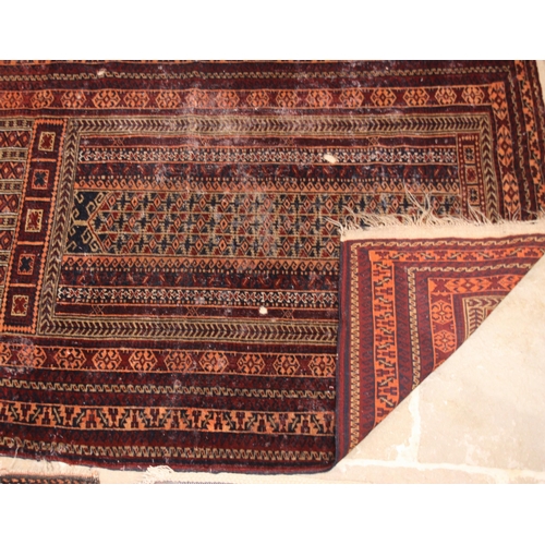 636 - Three assorted Caucasian rugs, to include; a panel design on an ivory ground, 145cm x 102cm, a Bohka... 