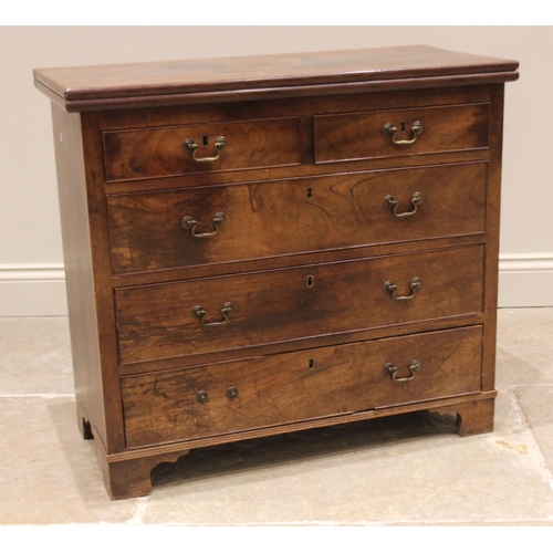 718 - A George III mahogany bachelors chest of drawers, the fold-over top above an arrangement of two shor... 