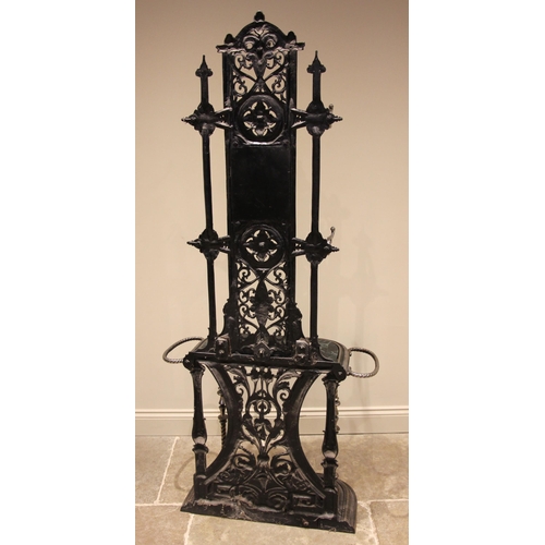 751 - A black and silvered cast iron Coalbrookdale style hall stand, 20th century, the openwork back centr... 