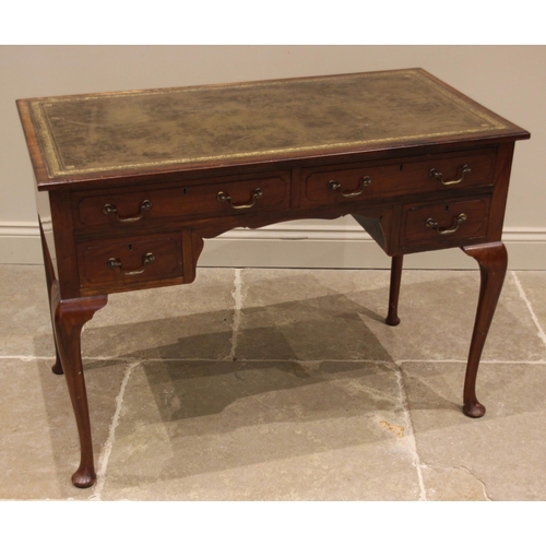 760 - A walnut writing desk in the George II style, early 20th century, the moulded top inset with a gilt ... 