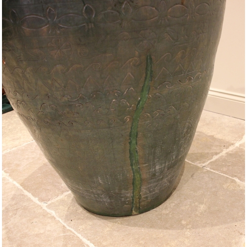 795 - A large Moroccan glazed urn, of typical tapering form, incised with sgraffito detail and applied wit... 