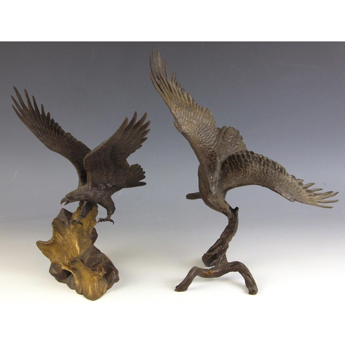 546 - Ronald Van Ruyckevelt (b.1928), 'Wings Of Glory', a bronze model of an eagle above a rocky outcrop, ... 