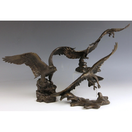 559 - Ronald Van Ruyckevelt (b.1928), 'Wings Of Glory', a bronze model of an eagle perched upon a rocky ou... 