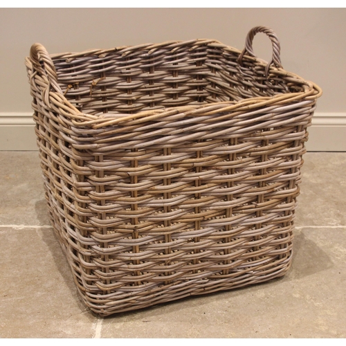 573 - A wicker log basket, of typical cubic form, with loop side handles, 50cm H x 57cm Sq