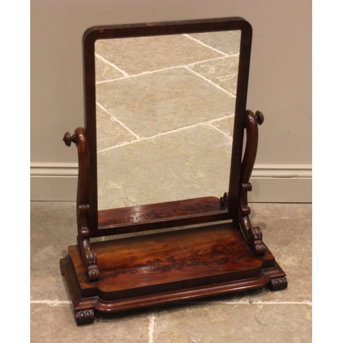 627 - A mahogany dressing table mirror, mid 19th century, the rectangular mirrored plate within a plain fr... 