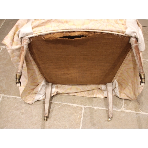 763 - A 19th century armchair, later re-covered in pastel watered silk effect fabric, the shaped back rest... 