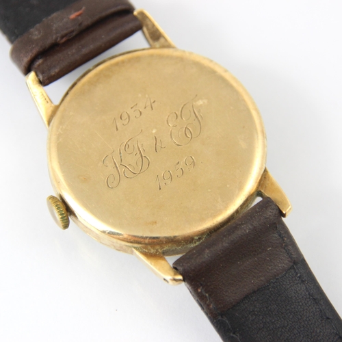 89 - A yellow metal cased Longines wristwatch, the cream circular dial with arrow and Arabic markers and ... 