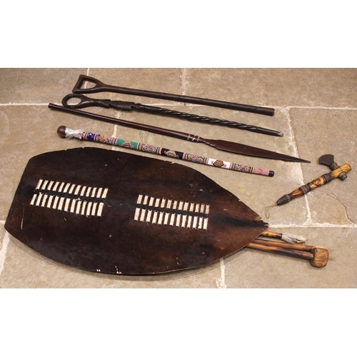 530 - A collection of African Tribal items, to include a Ndebele Nguni bead work staff, 89cm long, a Congo... 