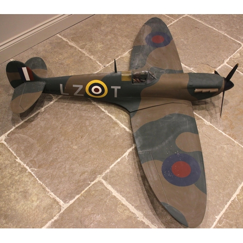 566 - A  kit built large scale model of a World War II Supermarine Spitfire LZ T N6100, painted paper on a... 