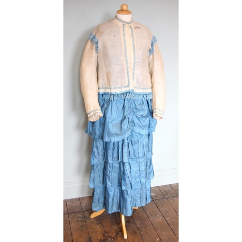 588 - A Victorian striped silk taffeta princess line dress, circa 1880, with bustle back and flounced skir... 