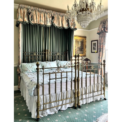 766 - A Victorian lacquered brass king-size bed frame, formed from twin single beds, each of the head and ... 