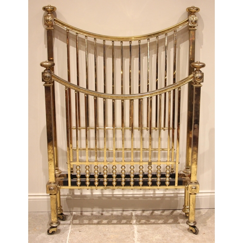 740 - A Victorian lacquered brass single bed frame, the head and foot boards formed with a concave top rai... 