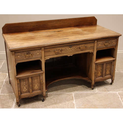 770 - An Edwardian rosewood and inlaid dressing table, by Thomas Edwards & Son, the moulded top with inlai... 