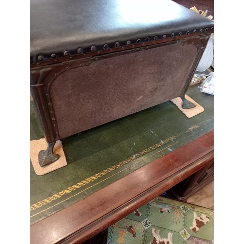 535 - An Arts and Crafts embossed copper covered wooden coal box/stool, in the manner of Archibald Knox, f... 